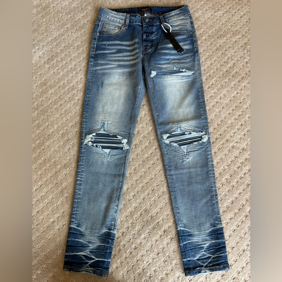 Amiri distressed embroidered patch acid wash jeans men’s size 32x32 luxury jeans